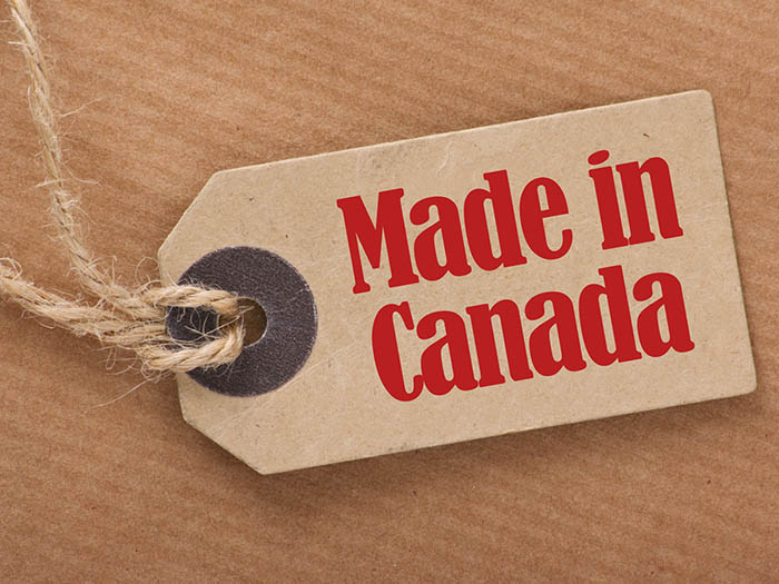 A brown paper price tag advising to people to 'Made in Canada'