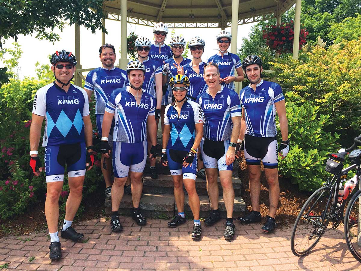 Beth Wilson (centre) and her husband, Brent (far left), and bicycling team at the 2015 Ride to Conquer Cancer