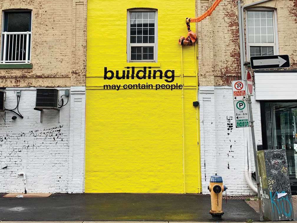A building on Toronto's Queen Street West with No Name branding 