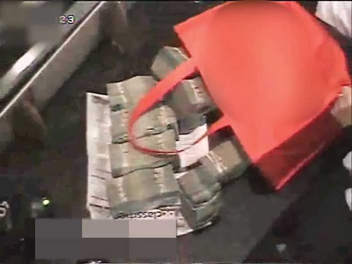 Video still of money in a B.C. casino