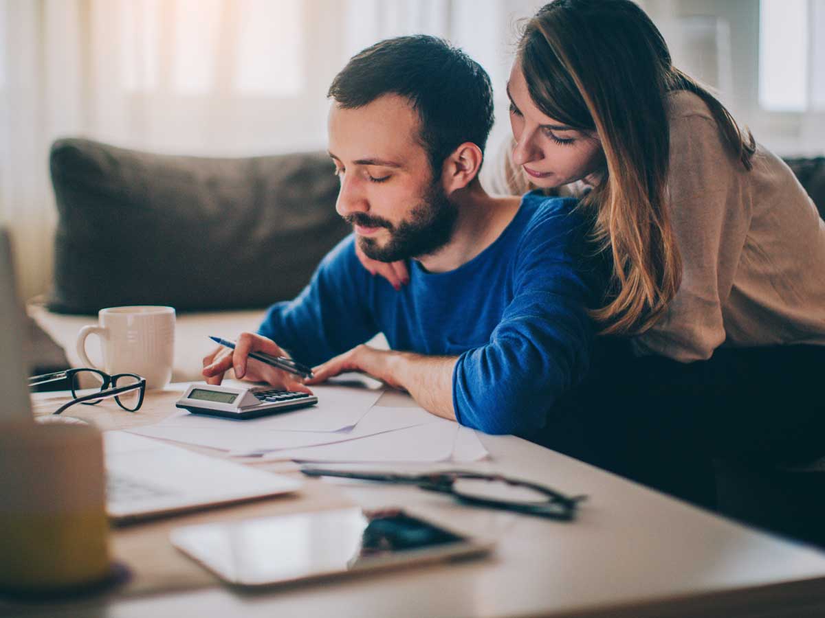 Couple reviewing bills together