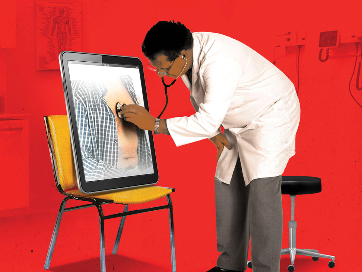 A doctor examines a tablet with a stethoscope