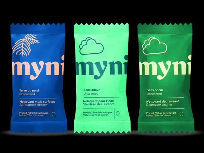 Three individual packages of Myni soap are shown 