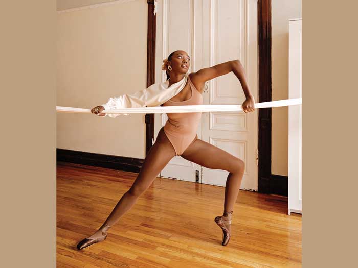 Woman dancing – Photo by Kreshonna Keane, Ten Toes Down exhibition, 2021 