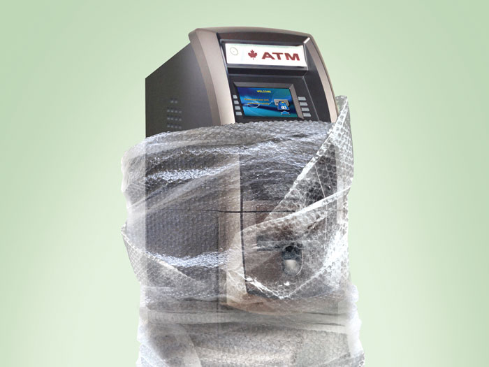 ATM wrapped in plastic packing material