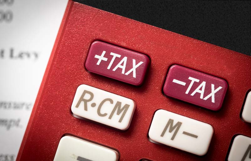 A close-up photograph of a tax calculator.