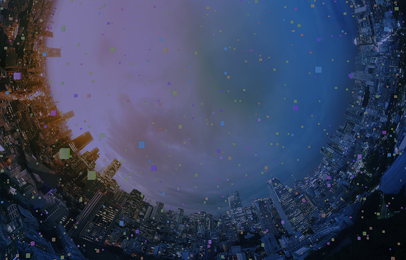 Grande ville semblant se trouver dans une boule de verre sous un ciel passant du rose au bleu d'où tombent des confettis.