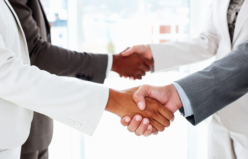 Business people shaking hands. 