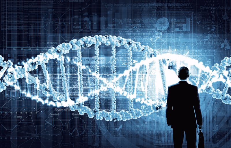 DNA on screen with man looking up