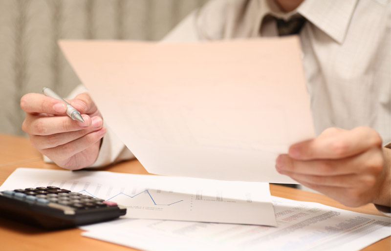Businessman reviewing financial statements