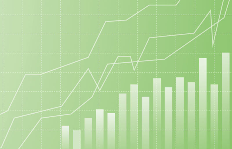 Business chart with a bar and a linear graph on a green and grid background. 