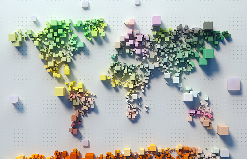 Digital generated image of world map made out of multicolored cubic pattern on white background.