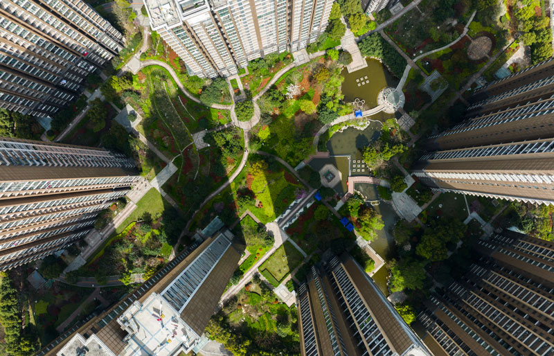 Top view of sustainable community area among skyscrapers.