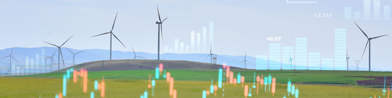 Field with wind turbines, financial information superimposed.
