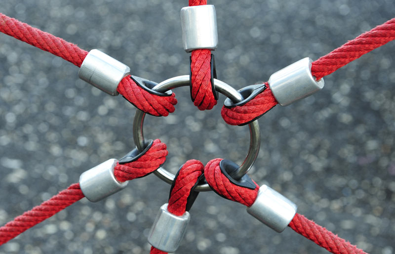 A metal ring linking 6 red ropes 
