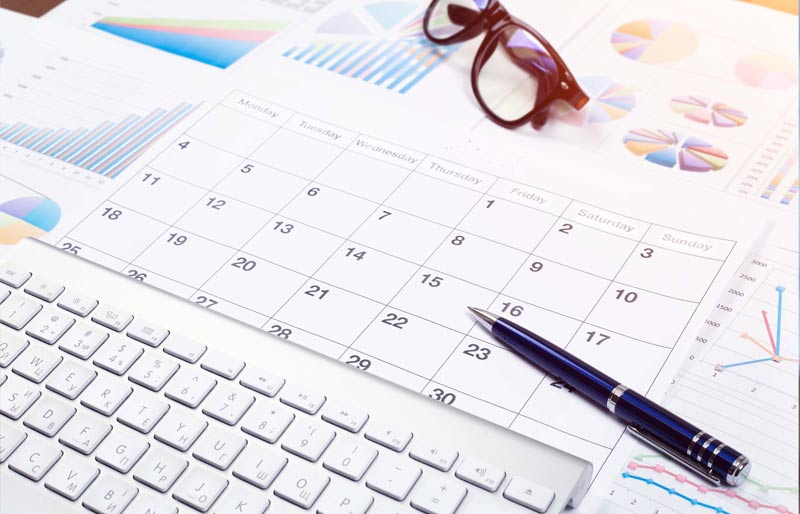 calendar, keyboard, financial charts, glasses